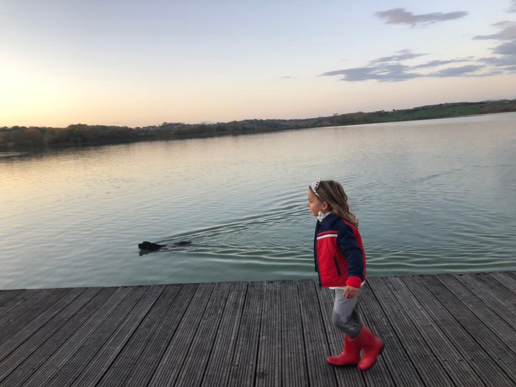 my daughter Stella and my dog Costantino at lake of Chiusi, Siena